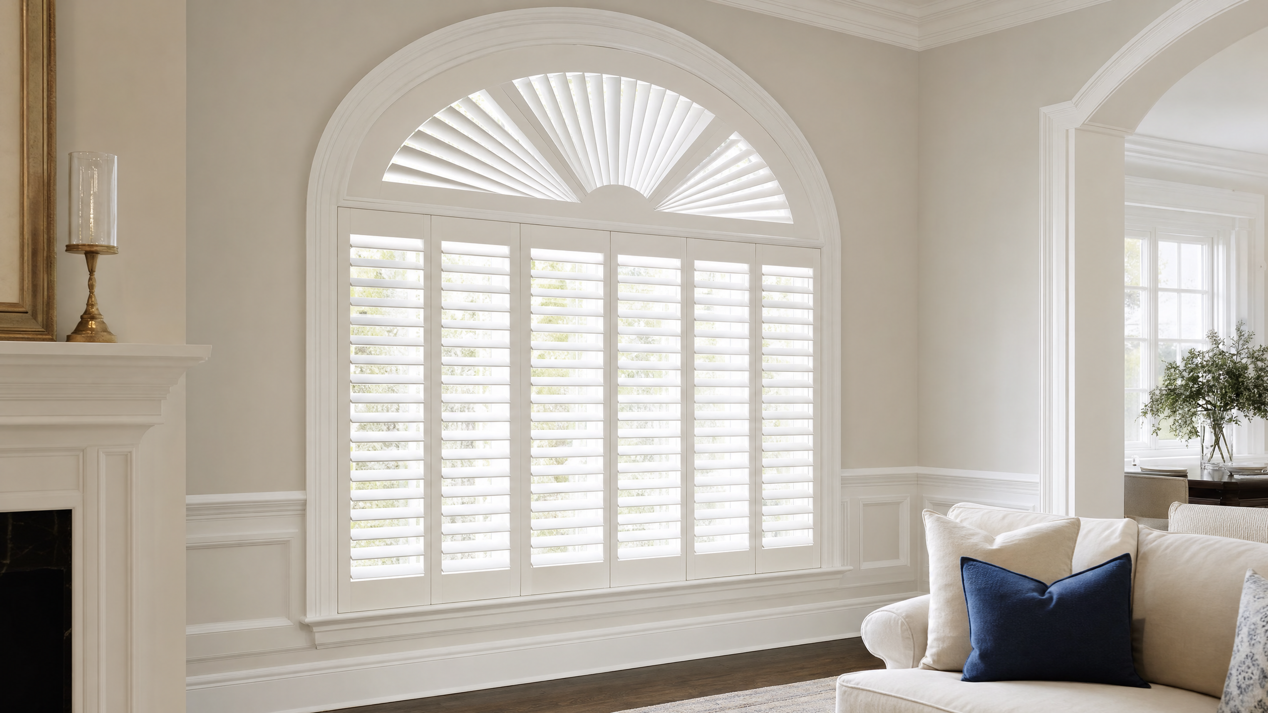 Arched and half-circle windows fitted with custom white plantation shutters